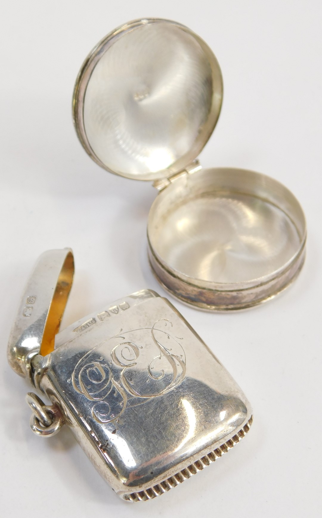 An Edward VII silver Vesta case, of curved plain form, monogram engraved, Chester 1902, and an - Image 2 of 3
