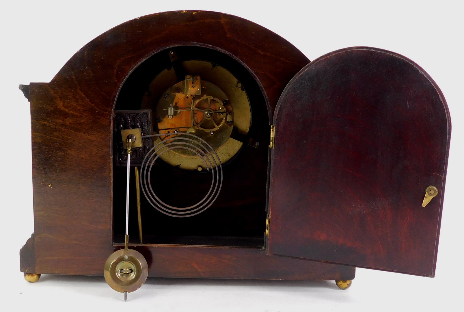 An early 20thC mahogany and inlaid mantel clock, the circular silvered dial bearing Arabic numerals, - Image 2 of 3