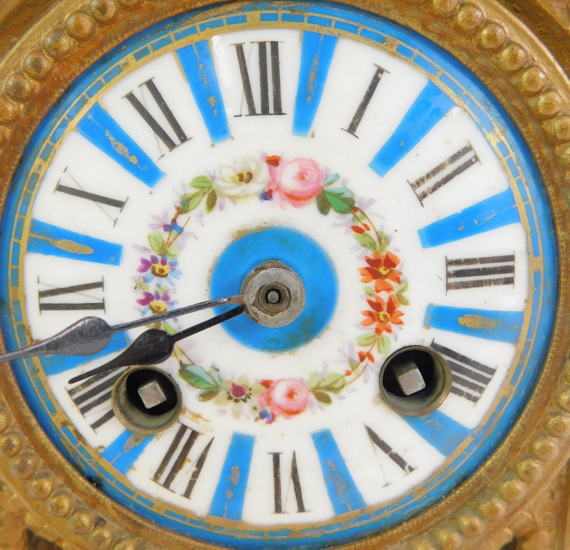 A 19thC French gilt metal and enamelled clock garniture, the white enamel circular dial bearing - Image 4 of 8