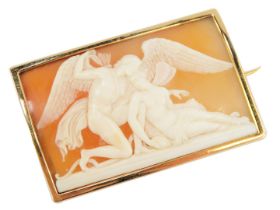 A 19thC shell cameo brooch, the rectangular panel depicting two figures in embrace, with wings, in a
