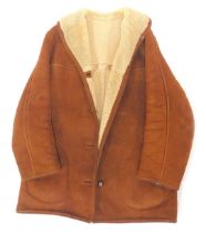 A brown sheepskin coat, underarm measurement approx 42cm.
