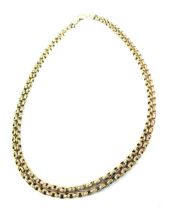 A longuard neck chain, with two row hammered link design, with arched clip and central bolt clasp,