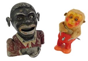 A 20thC Hong Kong clockwork windup toy, modelled as a monkey, impressed mark to underside, Made in