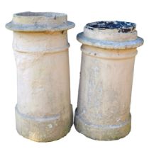 A pair of painted reconstituted stone chimney pot planters, 70cm high. (AF)