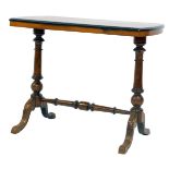 A Victorian walnut and marquetry inlaid occasional table, the shaped rectangular top inlaid with