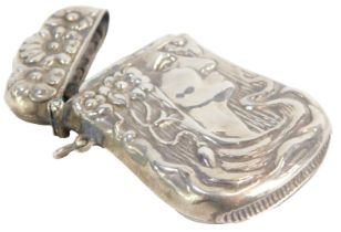 An Art Nouveau vesta case, formed as a female with a headdress, white metal stamped 925 sterling,