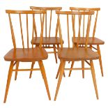 A set of four Ercol elm and beech dining chairs, model number 391, some bearing labels and each