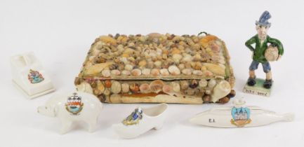 A shell encrusted 20thC jewellery box, with green baize lining, 4cm high, 24cm wide, 19cm deep, four