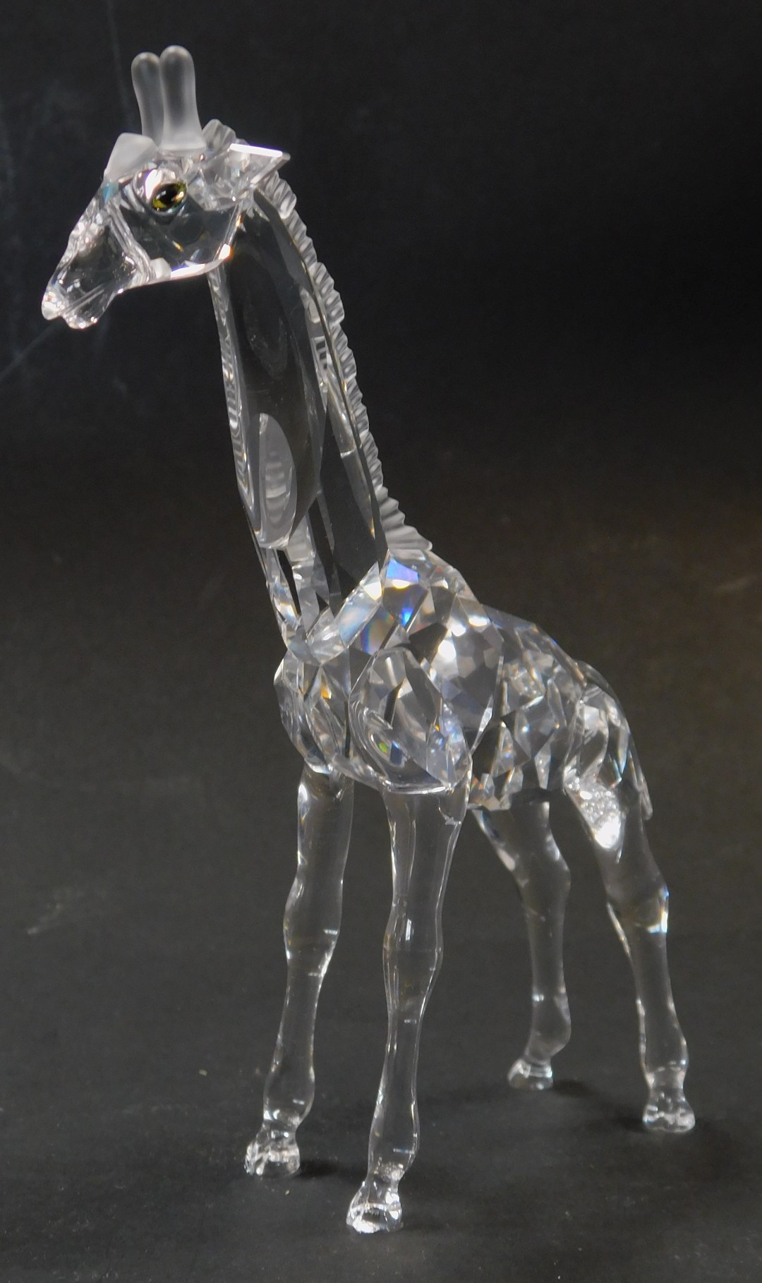 A Swarovski crystal figure modelled as a giraffe, 14cm high, boxed, together with two further boxes, - Image 2 of 3