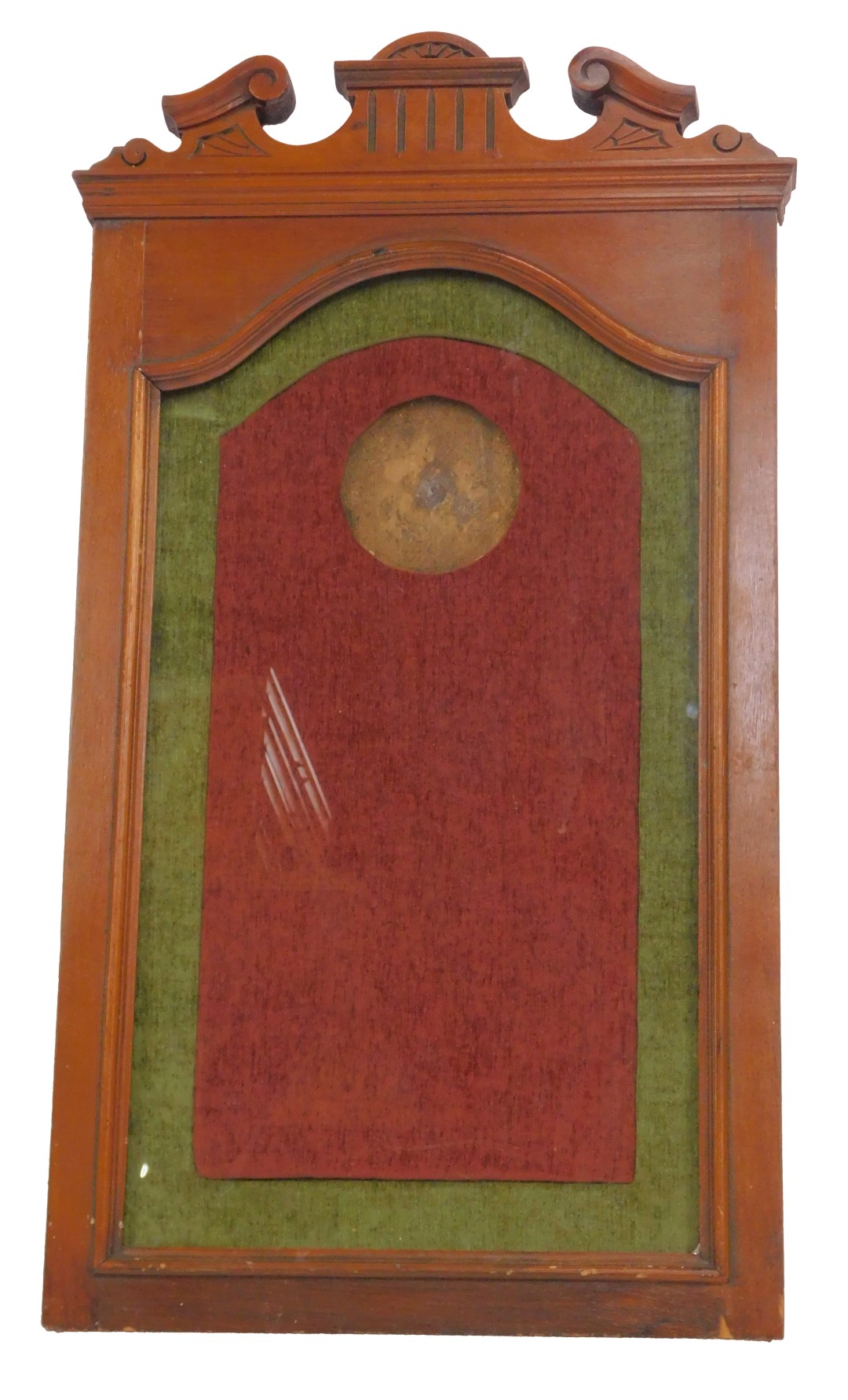 An Edwardian WWI Death plaque or penny walnut frame, the top with carved decoration above a shaped