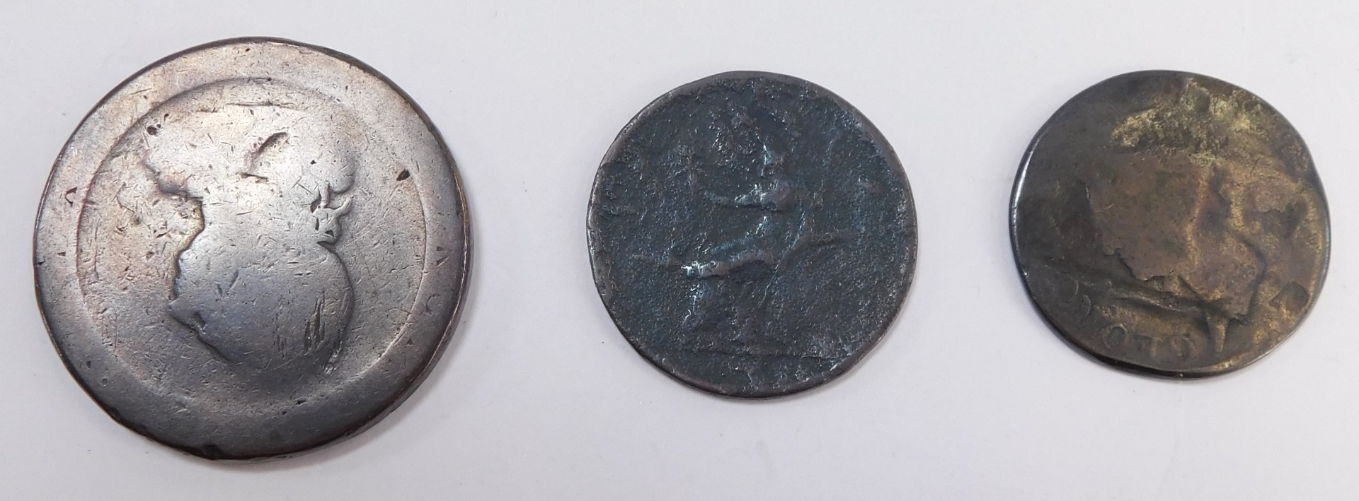 A George III cartwheel penny, two George III pennies, heavily rubbed, and a standard catalogue of - Image 2 of 4