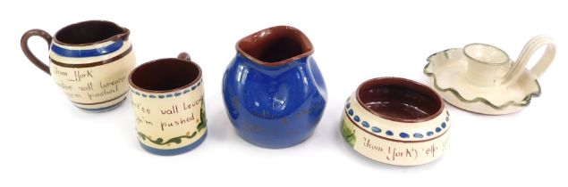 A group of Torquay ware, comprising mug, jug, circular dish, 12cm diameter, vase, blue glazed vase