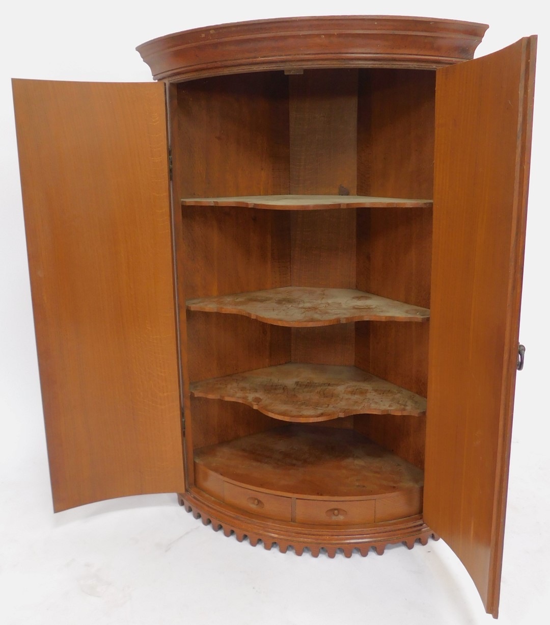 An early 20thC oak bow fronted corner cabinet, the top with a moulded edge above two doors, one - Image 4 of 5