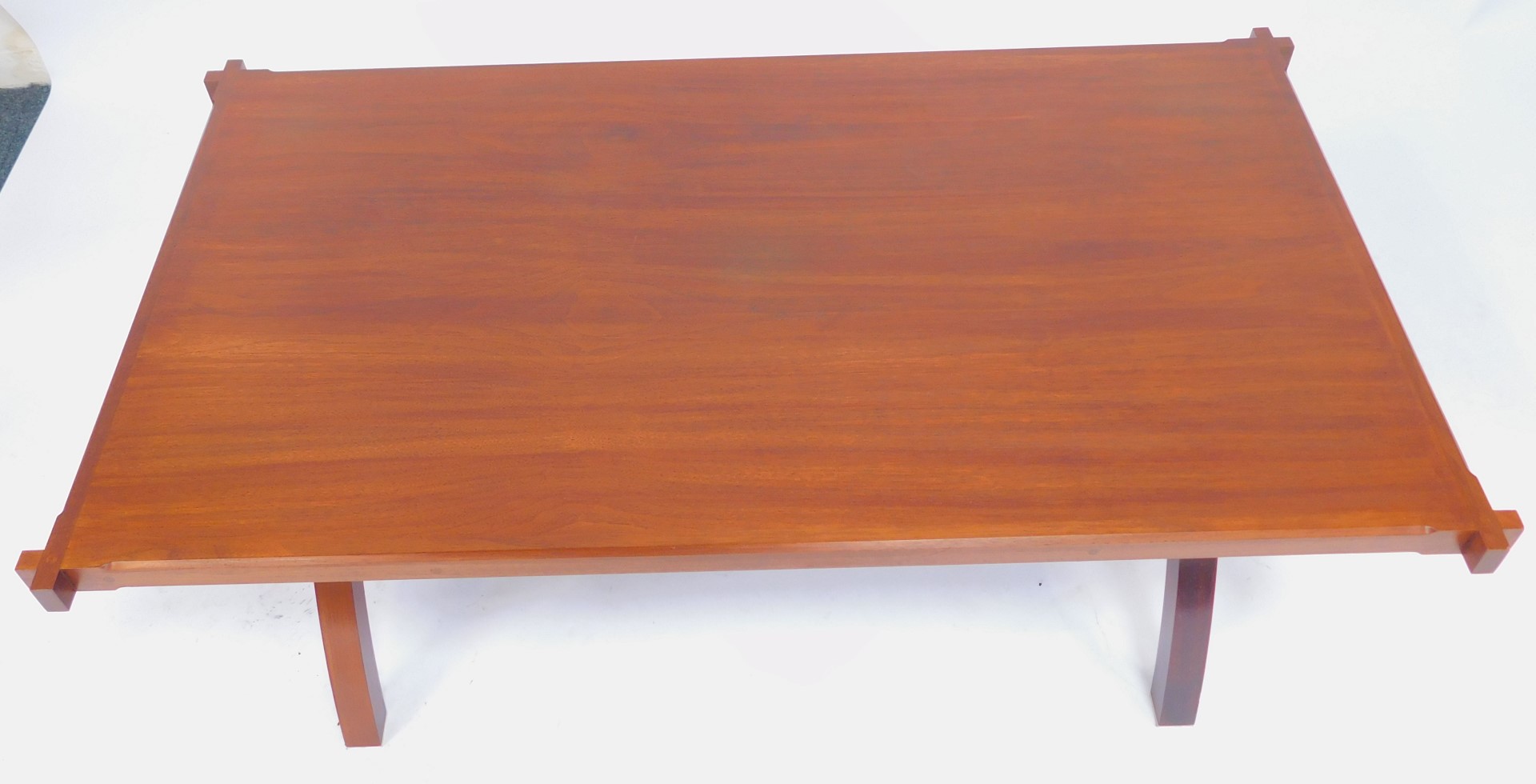 A modern bespoke walnut coffee table, rectangular top raised on arched support united by stretchers, - Image 2 of 4