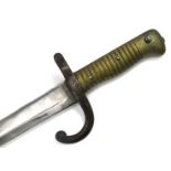 An 1866 pattern French Chassepot sword bayonet, with brass grip, and black painted metal scabbard,
