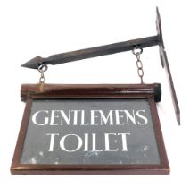 An early 20thC brown painted metal framed double sided swing sign, for Gentlemen's Toilet, on a