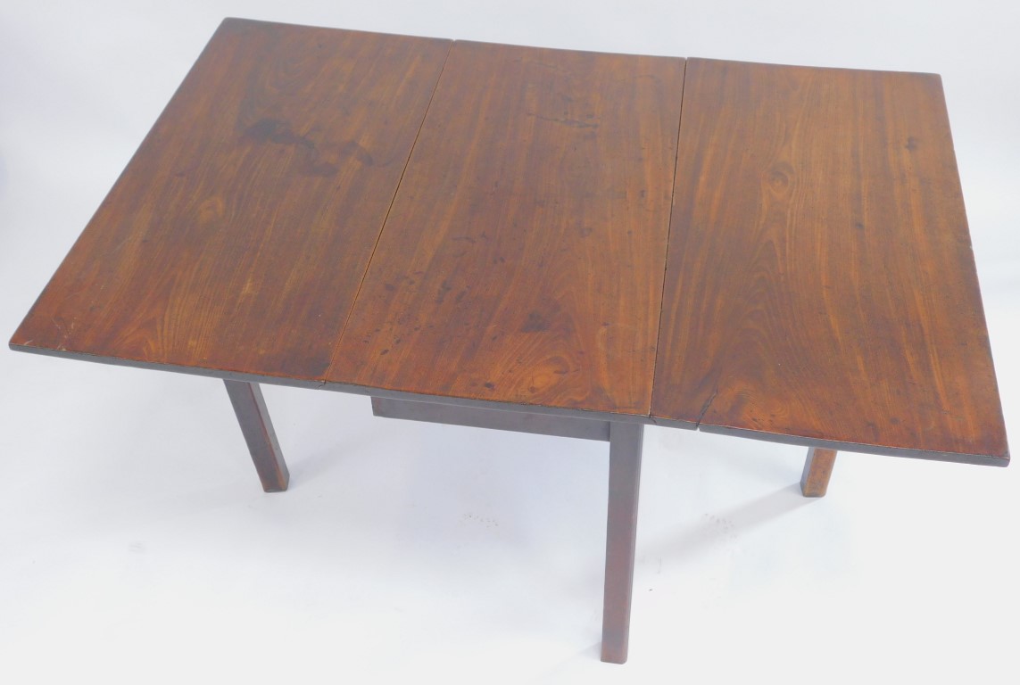 A 19thC mahogany drop leaf table, on square legs, 70cm high, 91cm wide. - Image 2 of 4