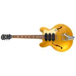 An Epiphone Riviera P93 MG electric guitar, serial number 11021502198, the body in gold coloured