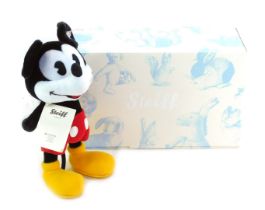 A Steiff Mickey Mouse, limited edition number 1130/2000, 24cm high, with certificate, boxed.