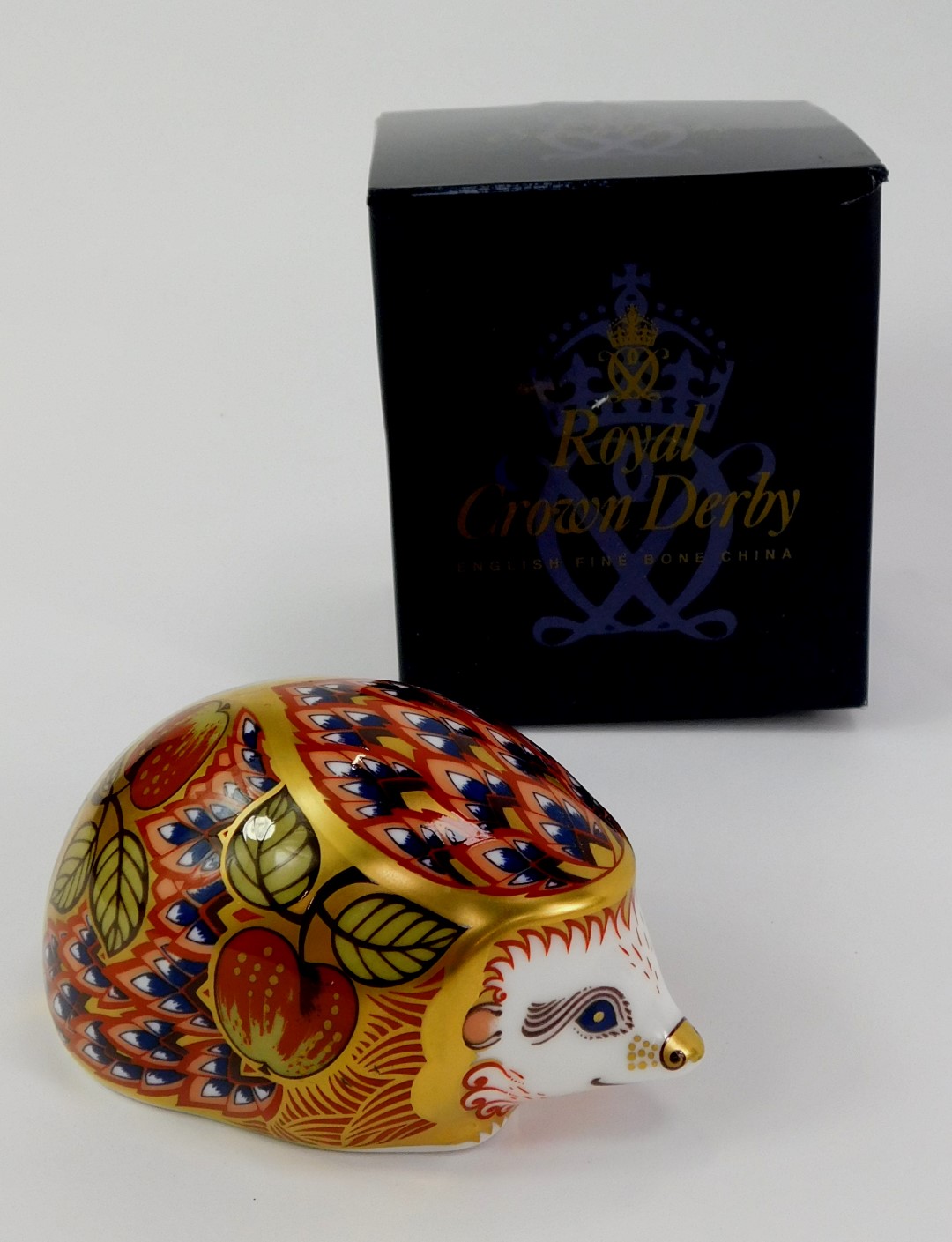 A Royal Crown Derby porcelain orchard hedgehog paperweight, an exclusive for the Royal Crown Derby - Image 2 of 3