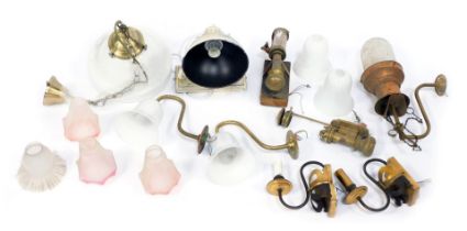 A group of light fittings, shades, etc., to include frosted glass shades, milk glass shades, a