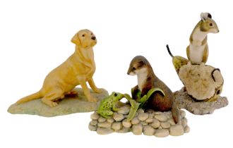 A group of Border Fine Arts figures, comprising seated golden retriever, 11cm high, otter beside