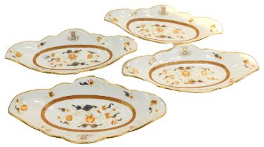 A set of four late 19thC Wedgwood side dishes, printed and painted with flowers, reserve