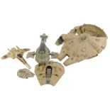 A Star Wars model of the Millennium Falcon, together with a X-Wing Fighter and a Slave 1 Ship.