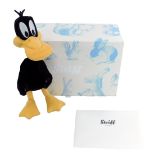 A Steiff Daffy Duck, limited edition number 479/2000, 35cm high, with certificate, boxed.