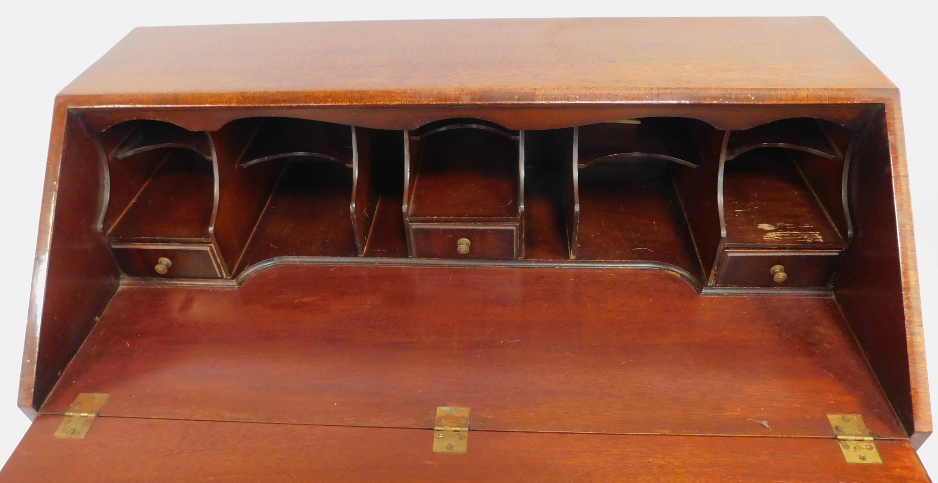 A 20thC mahogany and flamed mahogany bureau in George III style, the fall enclosing an arrangement - Image 5 of 5