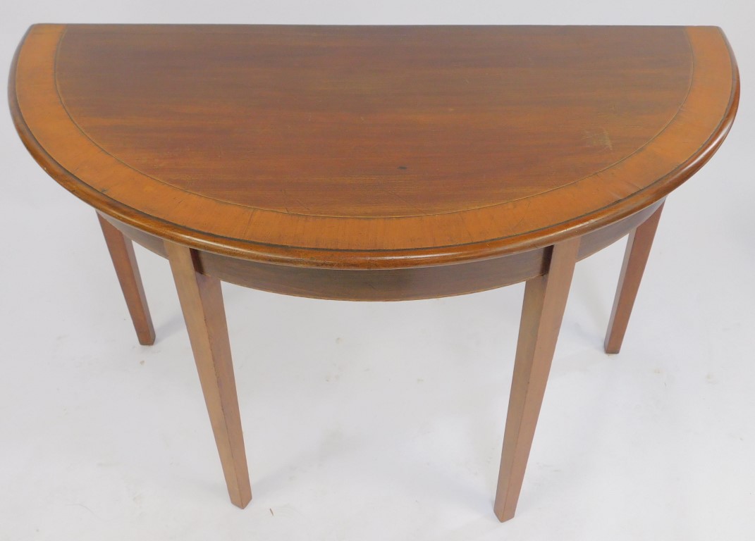 A late 19thC mahogany and cross banded D end table, raised on square tapering legs, 73cm high, 107cm - Image 2 of 3