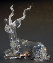 A Swarovski crystal figure modelled as a seated antelope, 12cm high.