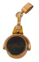 A carnelian swivel agate fob, yellow metal stamped 10ct, 5cm high, 8g all in.