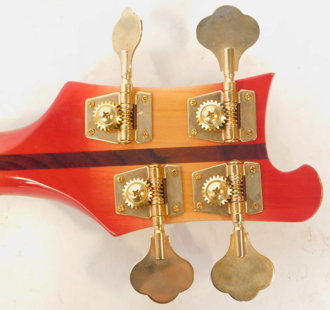 A Rirkenbacker electric bass guitar, the body in red, with the front panel fading to a yellow, the - Image 5 of 7