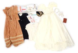 A group of vintage clothing, to include wedding dress, together with head band and gloves, a