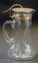 An Edward VII silver topped claret jug, the silver lid with a moulded thumb piece and silver collar,