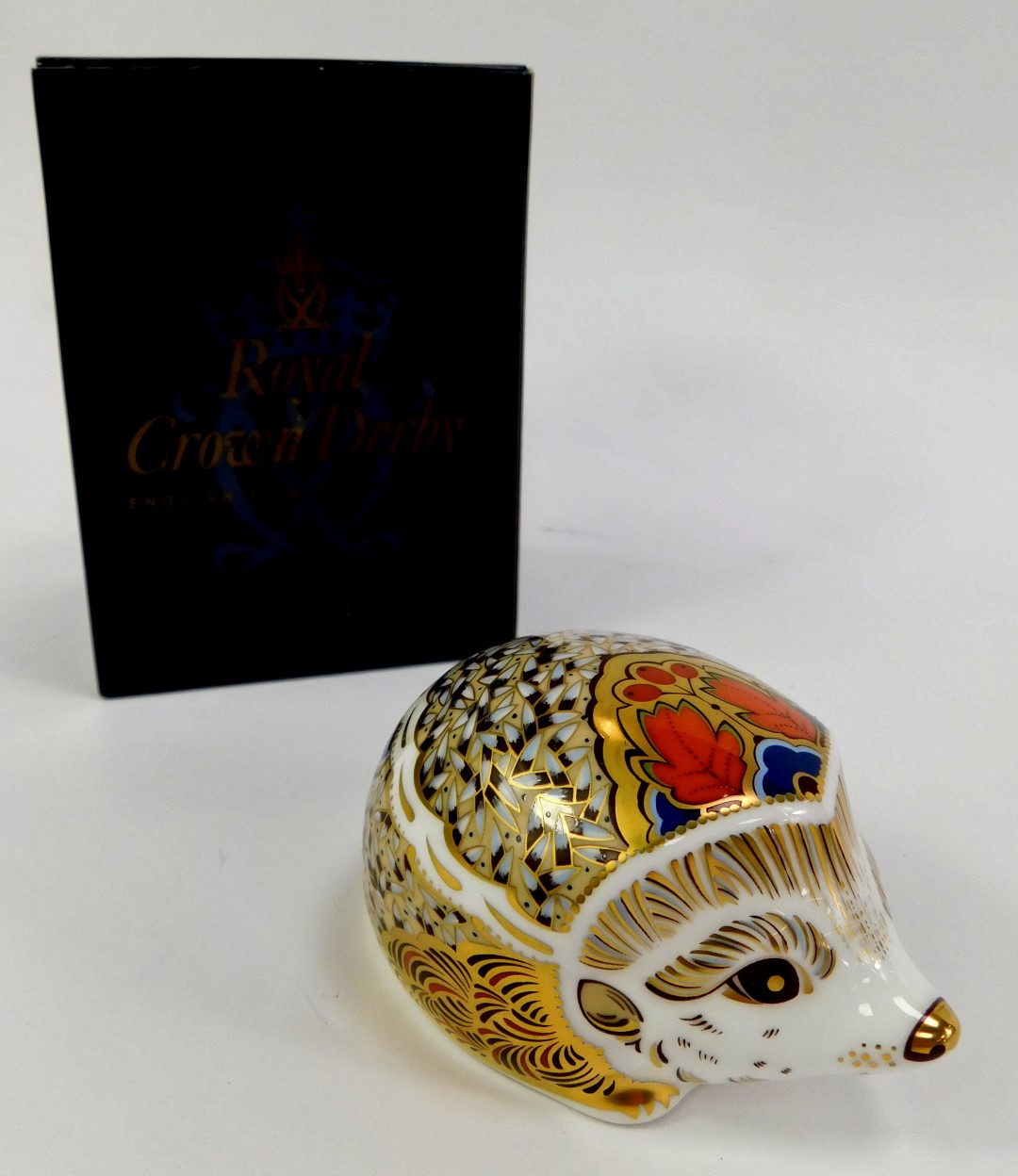 A Royal Crown Derby porcelain Hawthorne paperweight, red printed marks and gold stopper, 5cm high, - Image 2 of 3