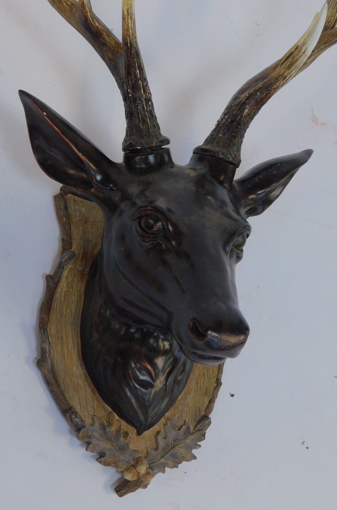 A 20thC decorative deer's head, the moulded plastic face and neck with bronzed effect, moulded - Image 2 of 2