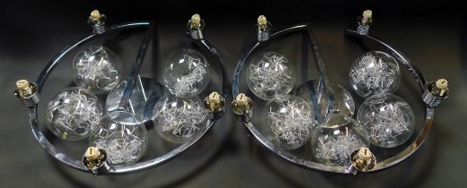 A pair of Wofi Germany steel ceiling lights, of circular form, with five glass orb shades, metal