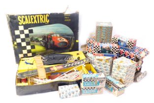 A group of Scalextric, to include a box containing track, cars, etc., together with further track,