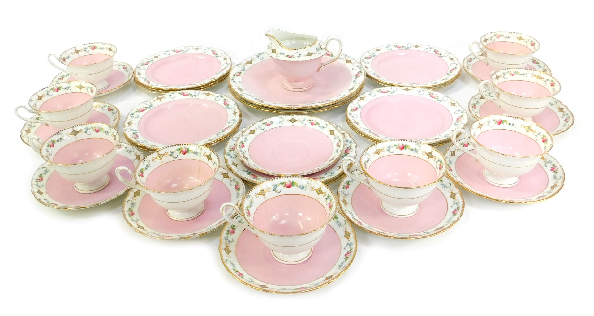 A Shelley porcelain part tea service, comprising nine teacups, ten saucers, eleven sandwich