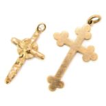 Two crucifix pendants, comprising one of plain design stamped 375, and another of hammered design