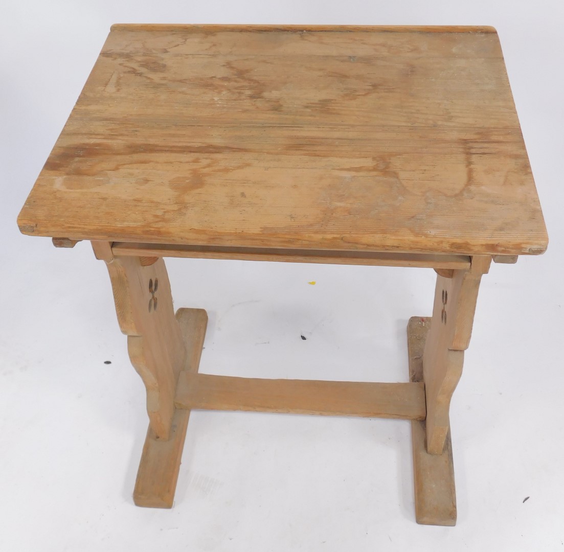 A pine lectern, the rectangular top, strut support with under tier, raised on two carved and pierced - Image 2 of 3