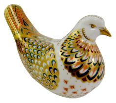 A Royal Crown Derby porcelain turtledove paperweight, red printed marks and gold stopper, 8.5cm
