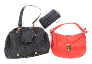 Two Jaeger handbags, comprising a black patent leather top handle bag, with bronzed hardware and