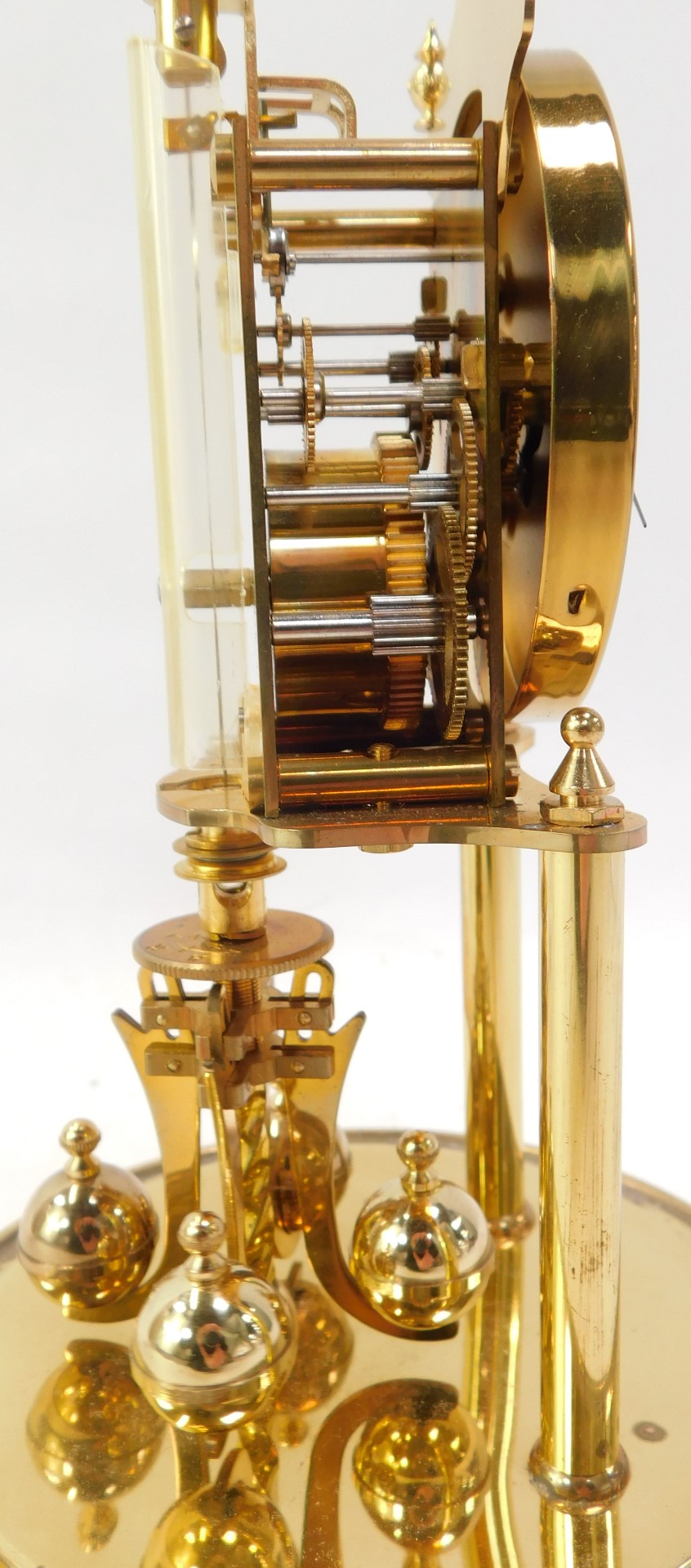 A 20thC German Kundo brass anniversary clock, the cream circular dial bearing Arabic numerals, key - Image 3 of 4