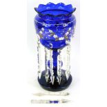 A Victorian blue glass lustre, hand painted with flowers, etc., 37cm high.