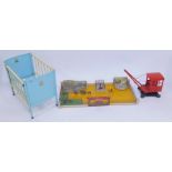 A Chiltern Toys metal and wooden framed toy cot, together with a mid century zoo play set, with