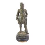 A spelter figure, modelled as Guillaume Le Conquerant (William The Conqueror), bearing signature for