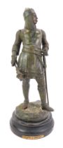A spelter figure, modelled as Guillaume Le Conquerant (William The Conqueror), bearing signature for